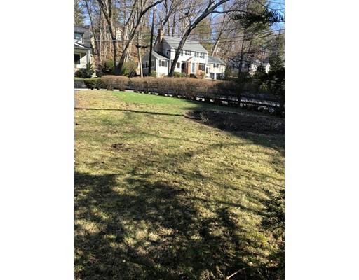 210 Varick Road Newton, MA 02468 - Photo 18 of 19 a view of a yard with wooden fence