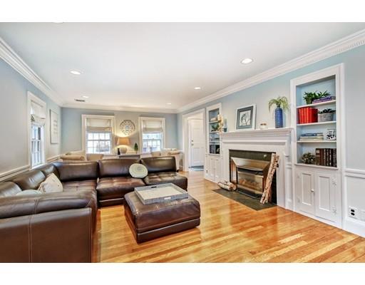 210 Varick Road Newton, MA 02468 - Photo 6 of 19 a living room with furniture and a fireplace