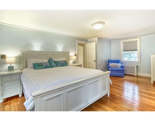 210 Varick Road Newton, MA 02468 - Photo 9 of 19 a bedroom with a bed and wooden floor