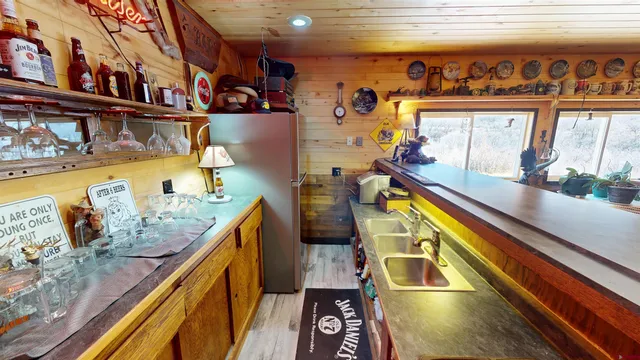 a view of swimming pool with seating area