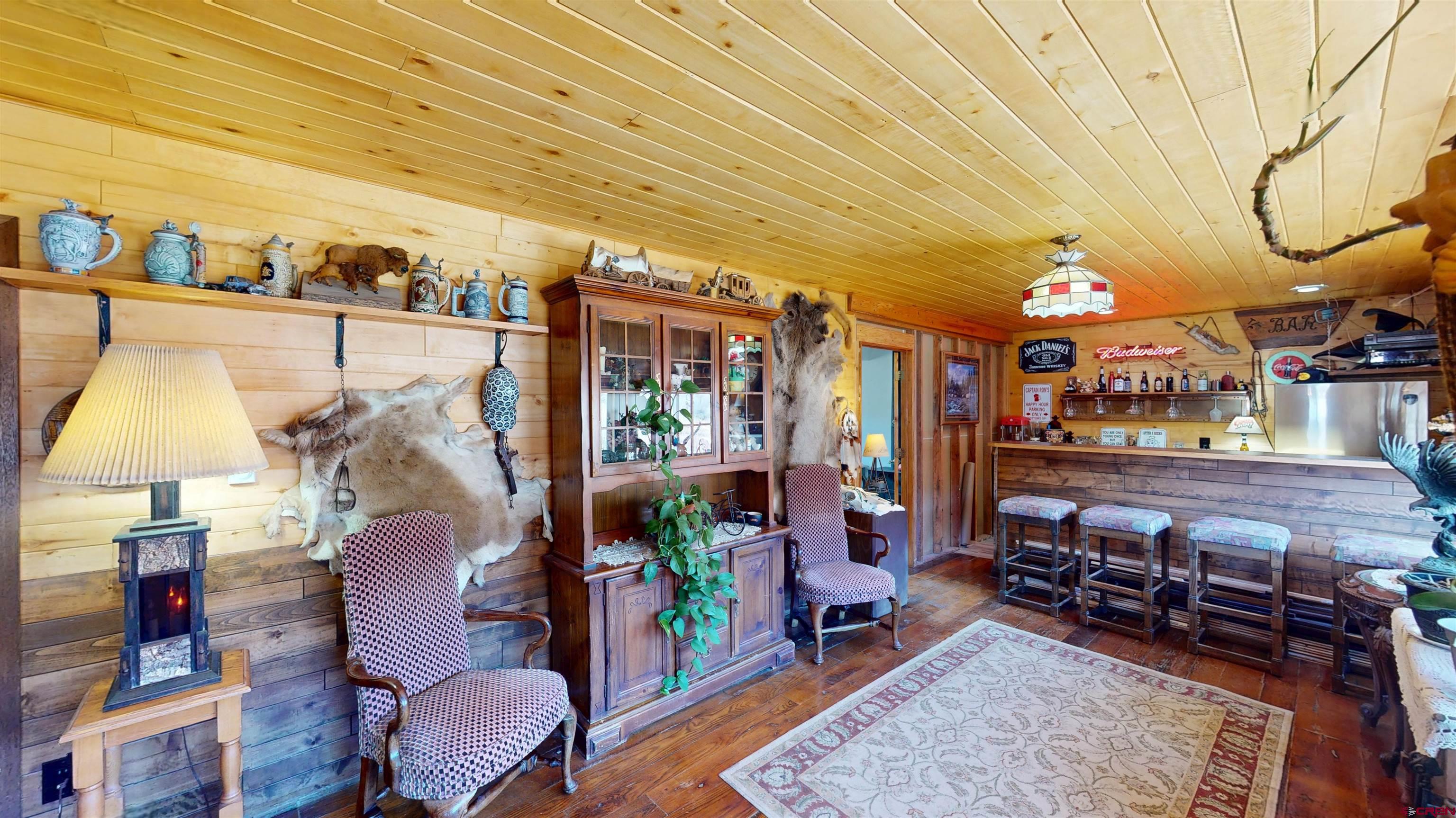 19253 Stevens Gulch Road Paonia, CO 81428 - Photo 34 of 45 a view of a chairs and tables in patio