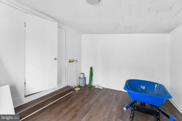 a bathroom with a toilet shower and a window