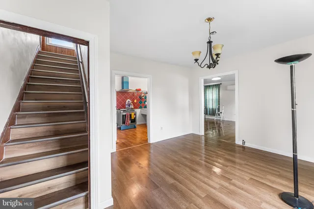 a view of an empty room with storage