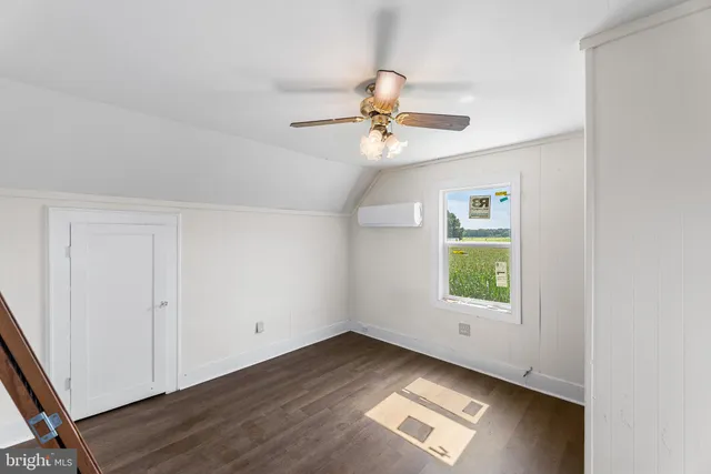 a view of a lake with a yard