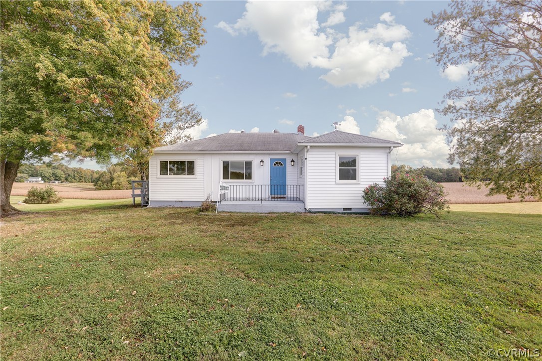 6228 Cross County Road Mineral, VA 23117 - Photo 1 of 26 a view of a house with a backyard