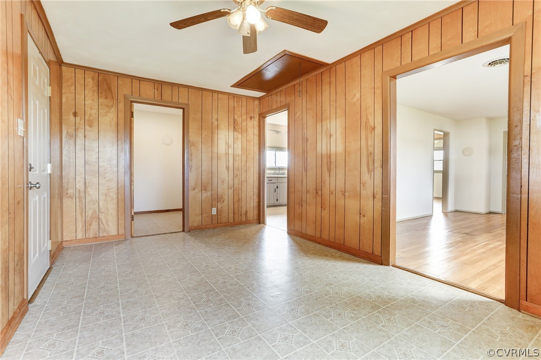 6228 Cross County Road Mineral, VA 23117 - Photo 16 of 26 an empty room with wooden floor and fan
