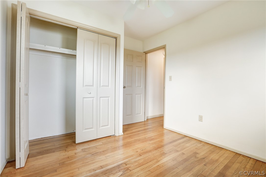 6228 Cross County Road Mineral, VA 23117 - Photo 21 of 26 a view of an empty room with wooden floor