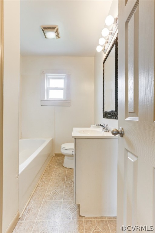 6228 Cross County Road Mineral, VA 23117 - Photo 26 of 26 a bathroom with a bathtub a sink and a mirror