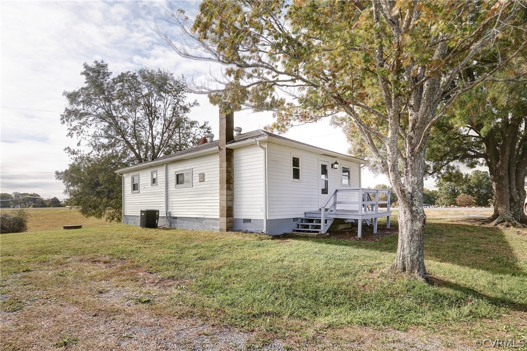 6228 Cross County Road Mineral, VA 23117 - Photo 7 of 26 a view of a house with a yard