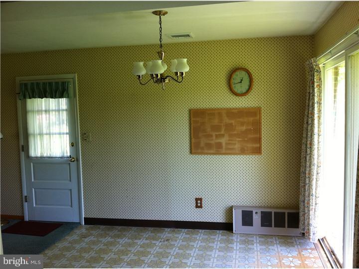 3270 Gallows Hill Road Riegelsville, PA 18077 - Photo 5 of 7 a view of a livingroom with furniture and window
