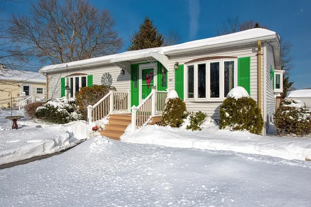 a front view of a house with a patio
