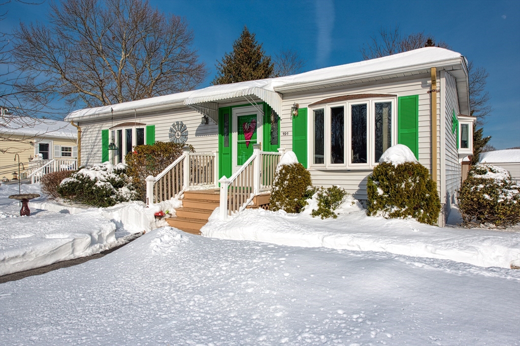 a front view of a house with a patio