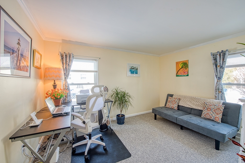 191 Red Oak Terrace Taunton, MA 02780 - Photo 13 of 28 a living room with furniture and a large window