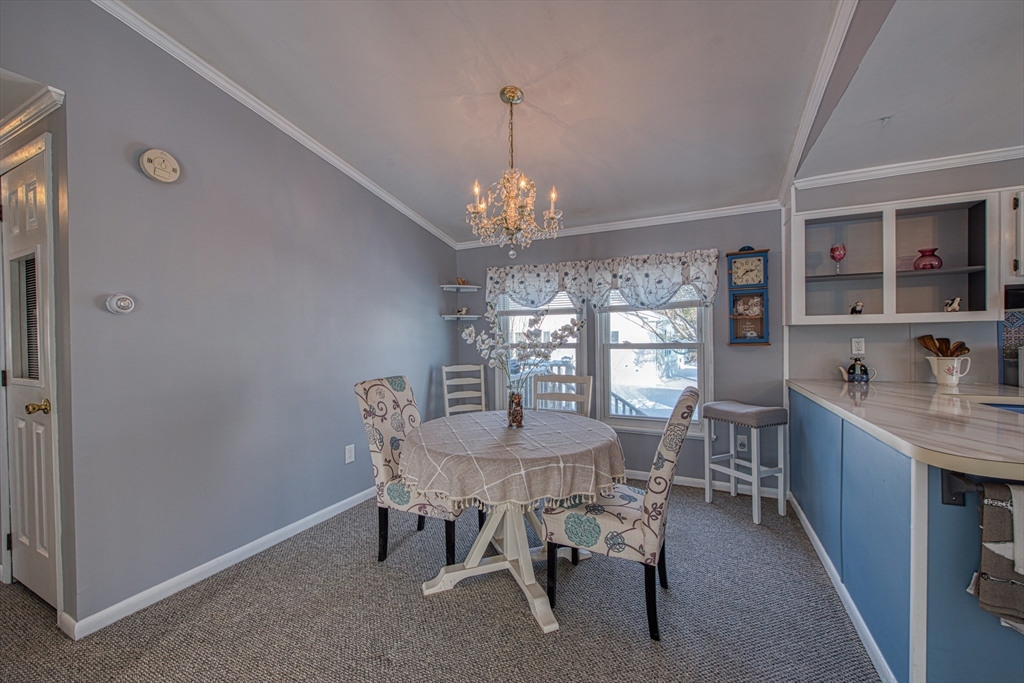 191 Red Oak Terrace Taunton, MA 02780 - Photo 5 of 28 a view of a dining room with furniture window and outside view
