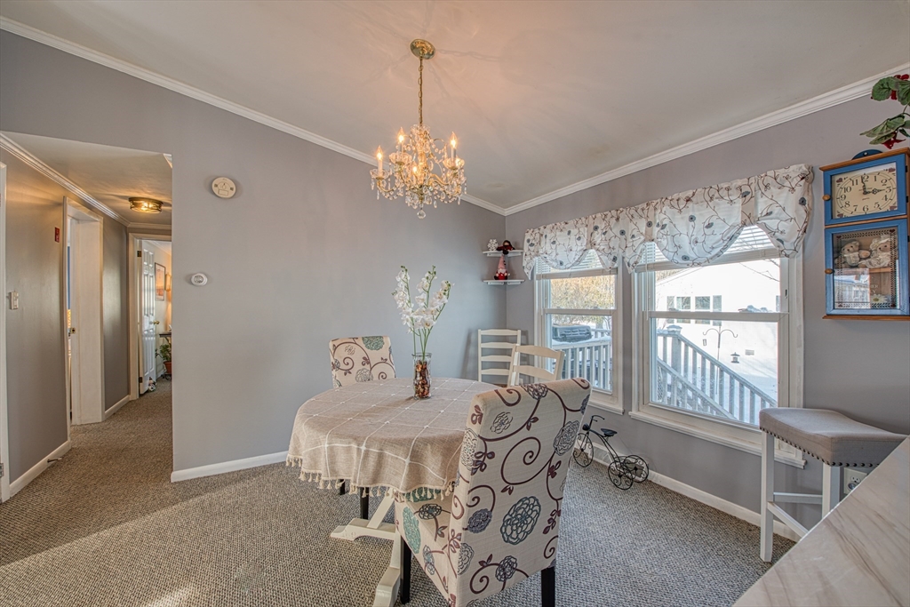 191 Red Oak Terrace Taunton, MA 02780 - Photo 6 of 28 a view of a dining room with furniture window and outside view