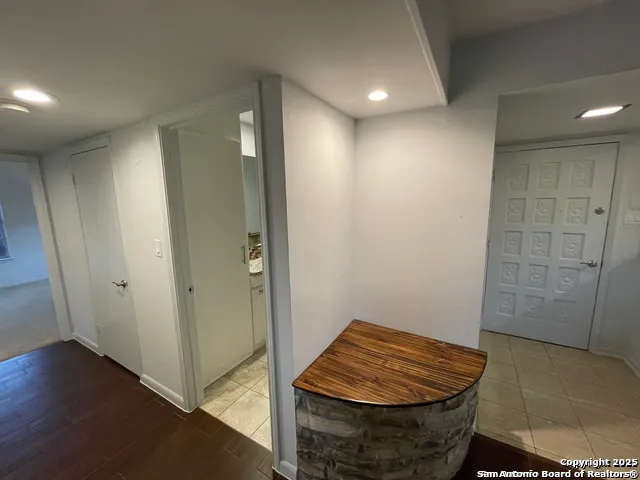 a bathroom with a sink and shower