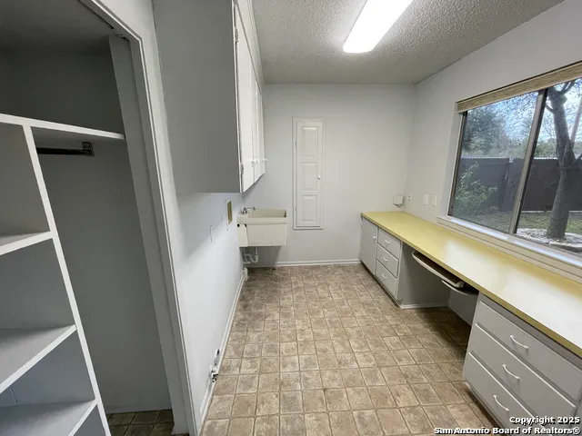 a bathroom with a bathtub sink and toilet