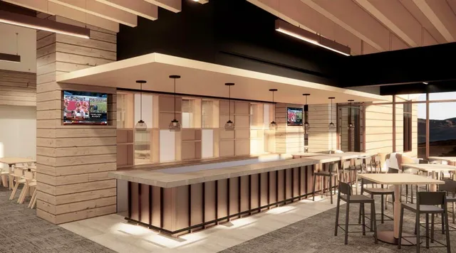 a view of a swimming pool with an outdoor seating