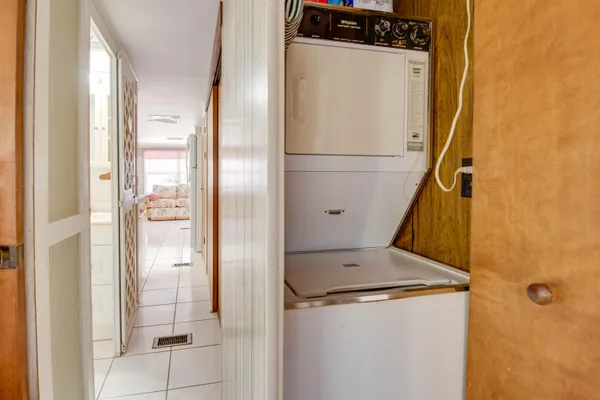 a bathroom with a shower and a sink