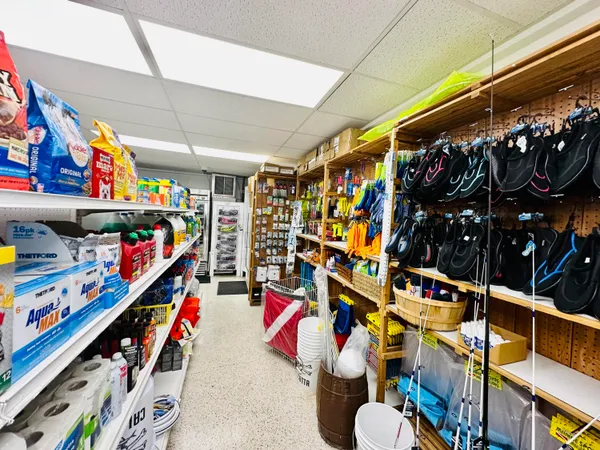 a view of a chairs and table in backyard