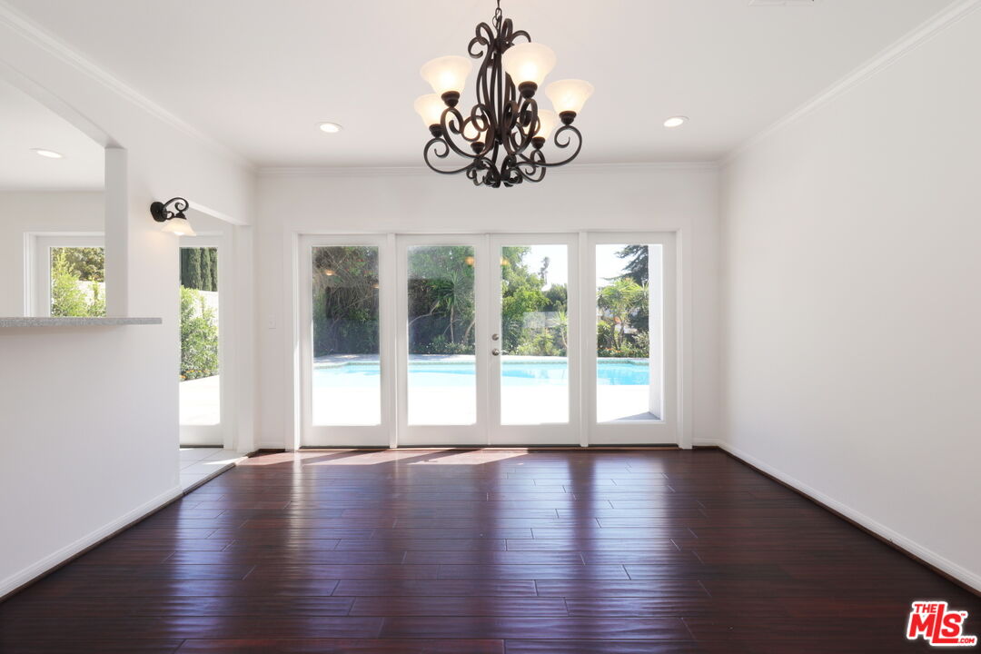 600 Luton Drive Glendale, CA 91206 - Photo 17 of 42 a view of an empty room with wooden floor and a window