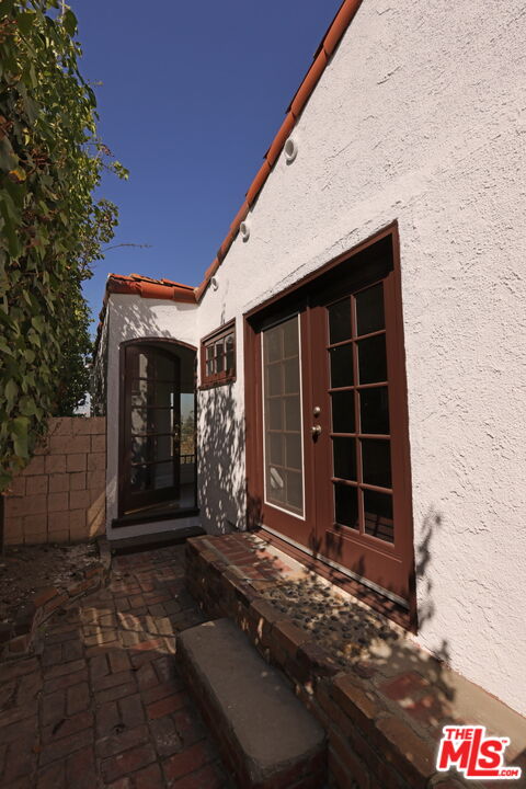 600 Luton Drive Glendale, CA 91206 - Photo 20 of 42 a view of a house with a door and wooden walls