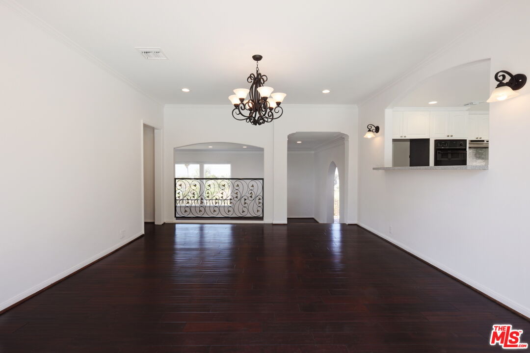 600 Luton Drive Glendale, CA 91206 - Photo 26 of 42 wooden floor in an empty room with a window
