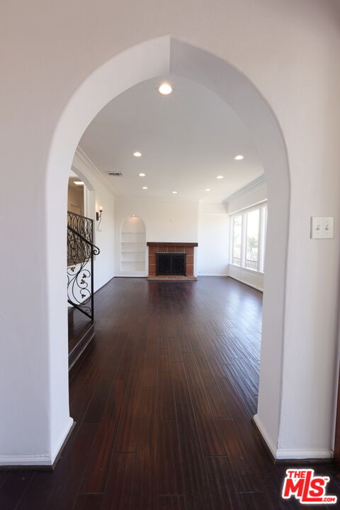 600 Luton Drive Glendale, CA 91206 - Photo 30 of 42 a view of a hallway with wooden floor and furniture
