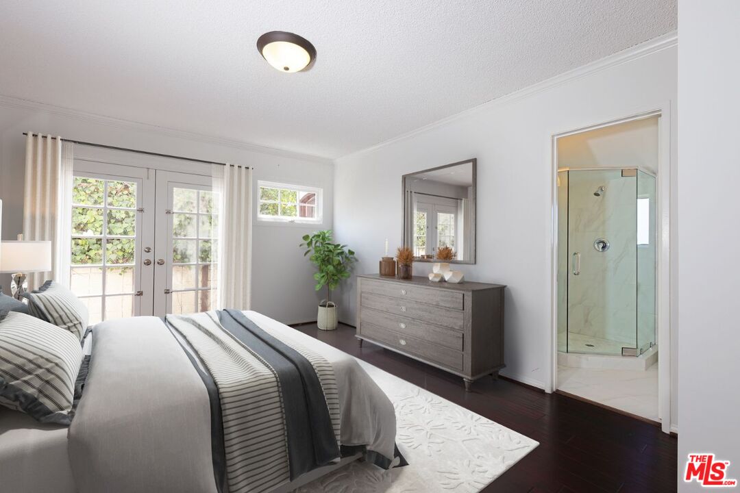 600 Luton Drive Glendale, CA 91206 - Photo 4 of 42 a bedroom with a large bed and a dresser