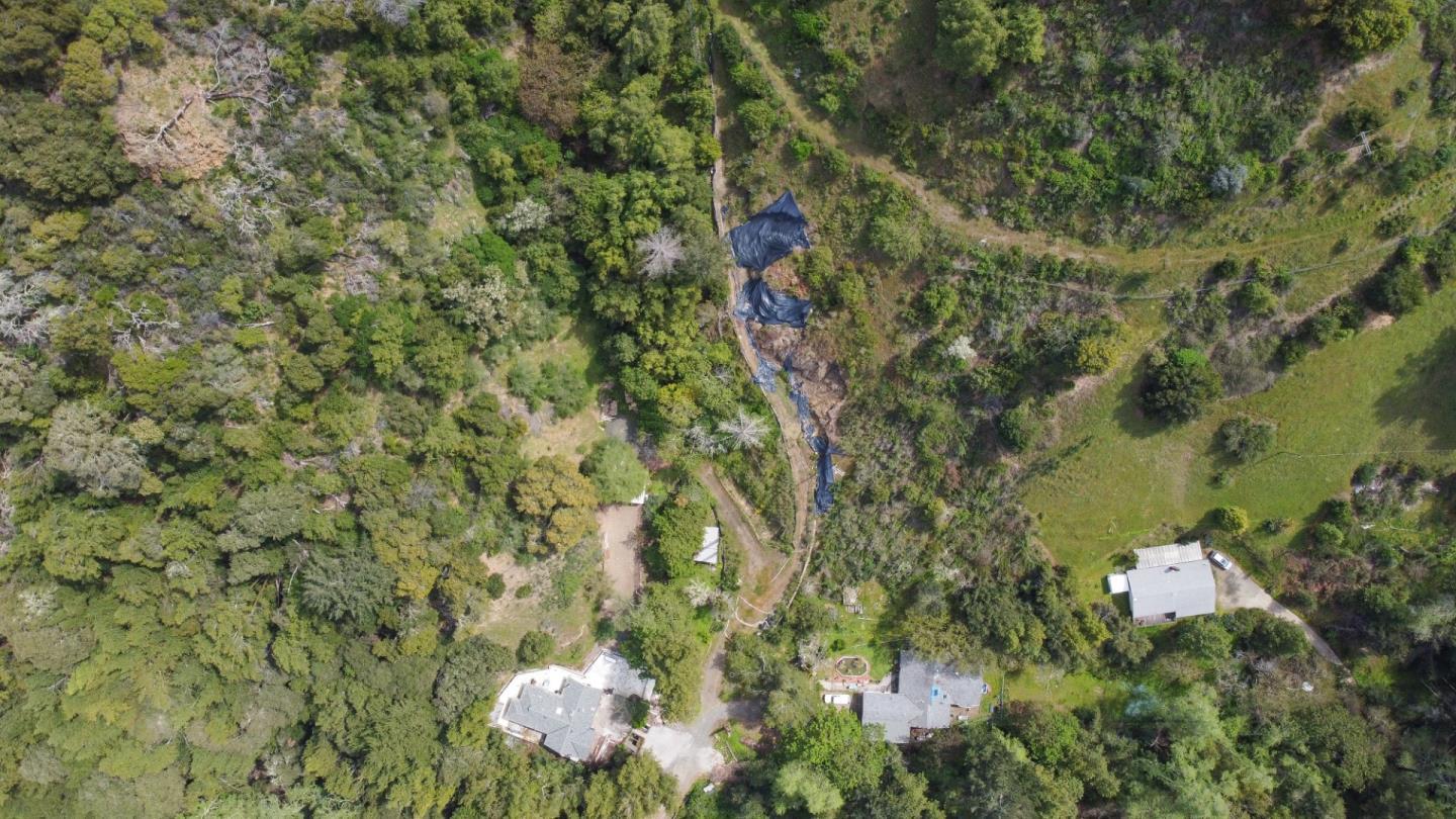 16503 Sanborn Road Saratoga, CA 95070 - Photo 12 of 15 an aerial view of a house with a yard and lake view