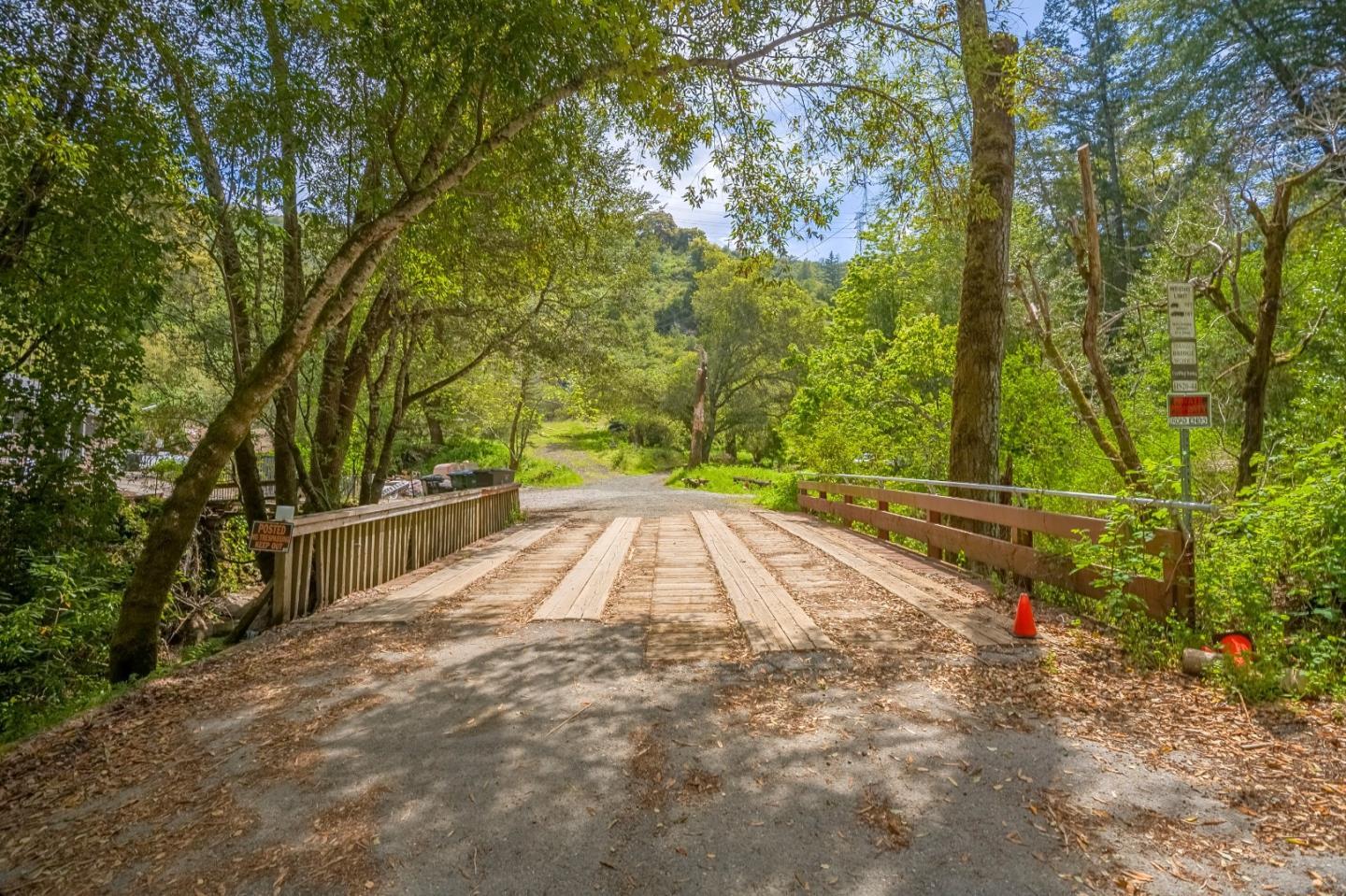 16503 Sanborn Road Saratoga, CA 95070 - Photo 2 of 15 a view of backyard with large trees
