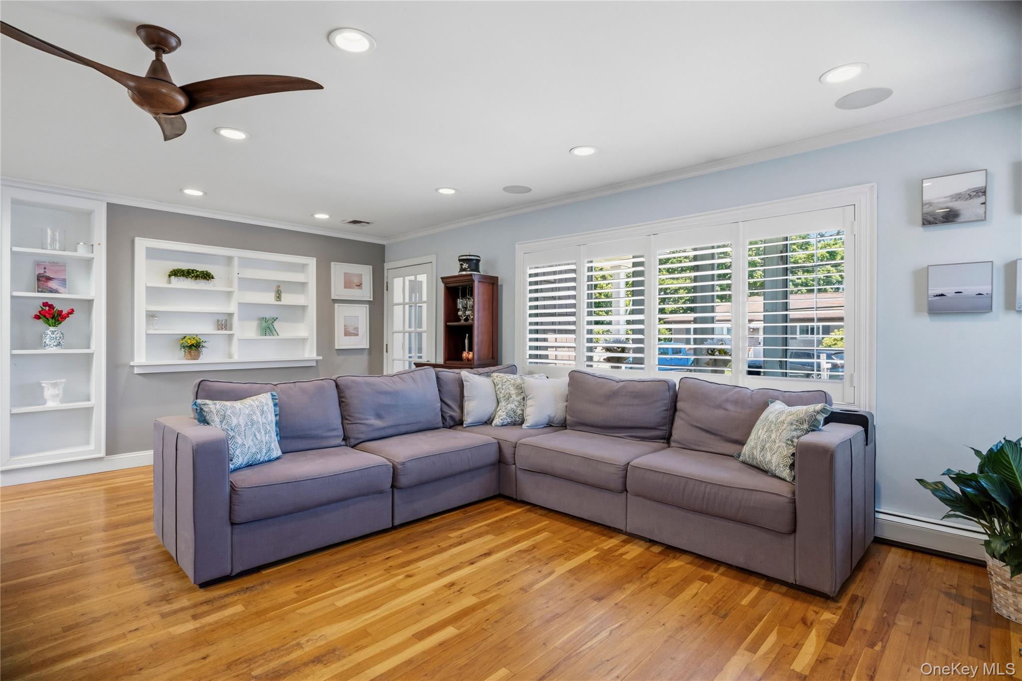 190 Sexton Road West Babylon, NY 11704 - Photo 9 of 28 a living room with furniture and a large window