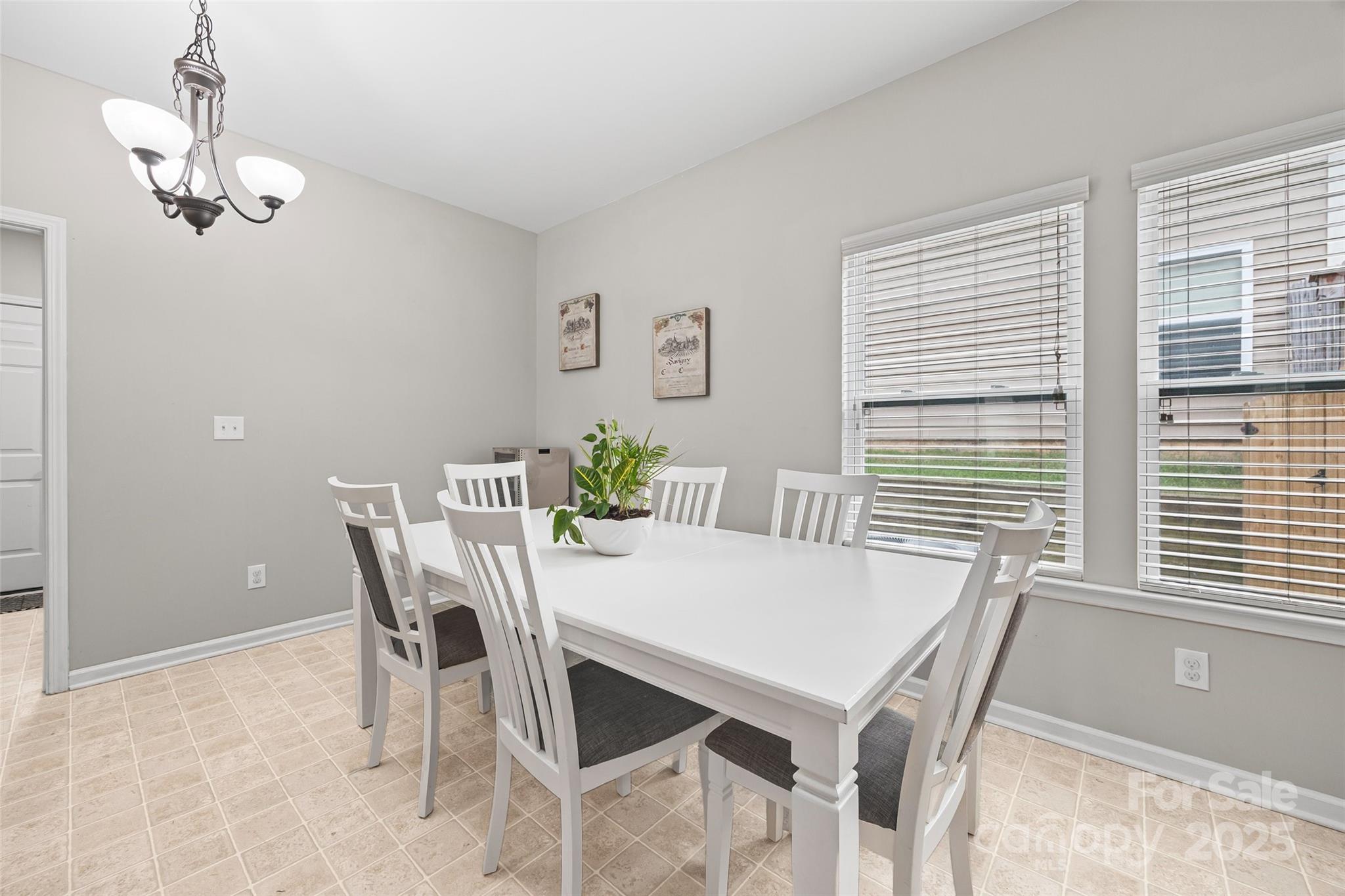611 Pondway Downs Rock Hill, SC 29730 - Photo 17 of 43 a view of a dining room with furniture and window
