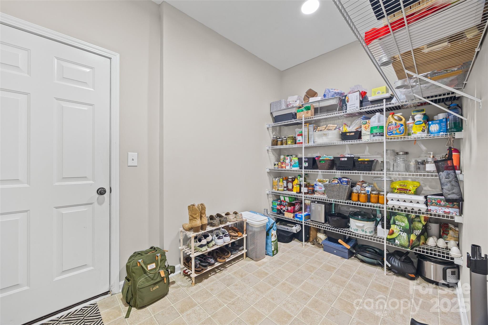 611 Pondway Downs Rock Hill, SC 29730 - Photo 20 of 43 a room with storage and a white wooden cabinets
