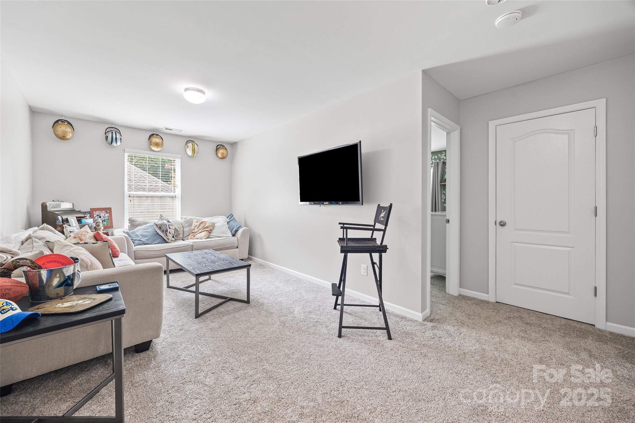 611 Pondway Downs Rock Hill, SC 29730 - Photo 21 of 43 a living room with furniture and a flat screen tv