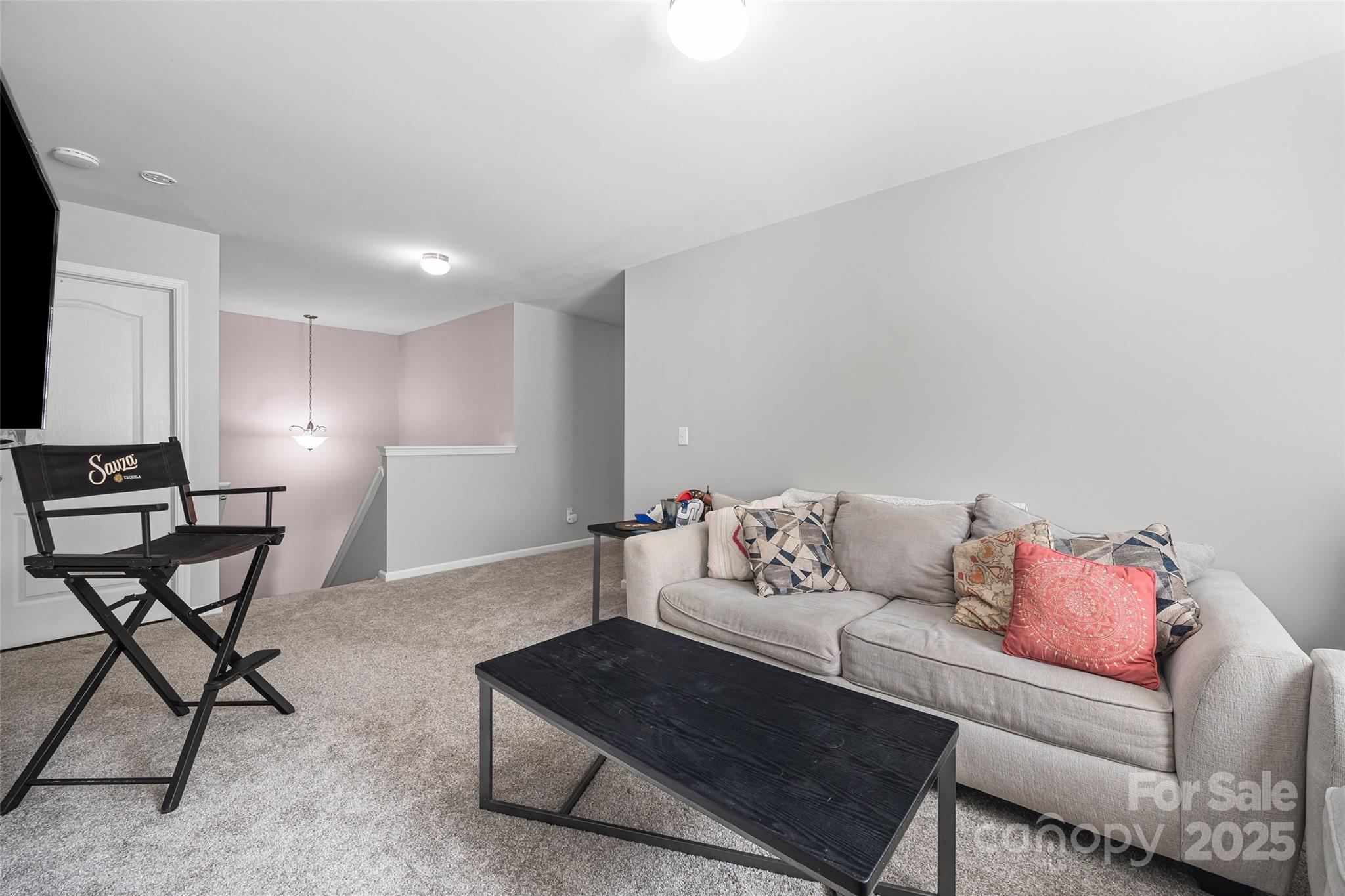 611 Pondway Downs Rock Hill, SC 29730 - Photo 22 of 43 a living room with furniture and a dining table with chair
