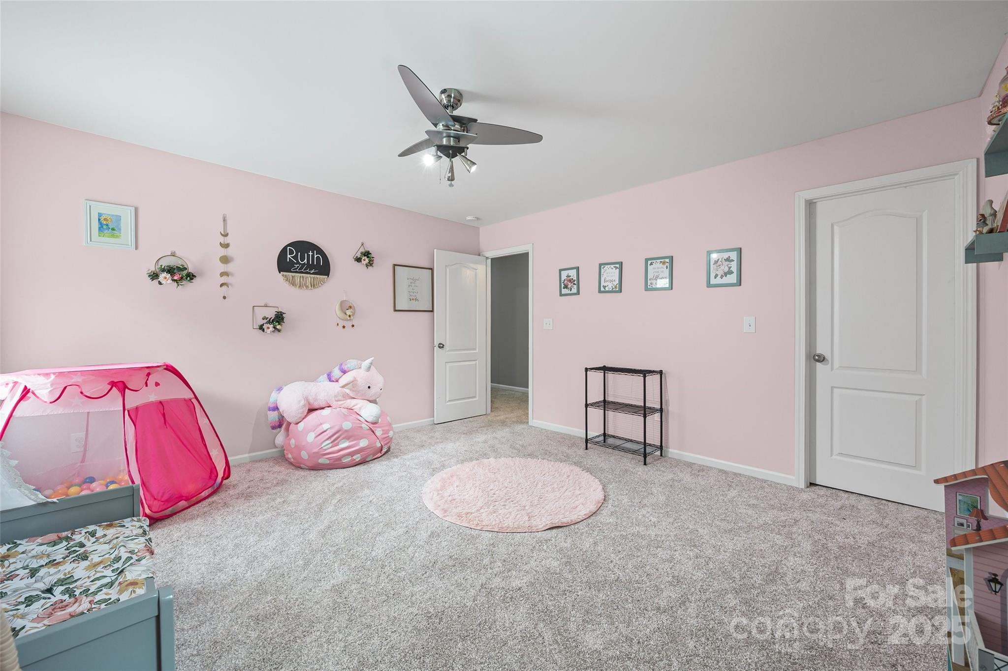 611 Pondway Downs Rock Hill, SC 29730 - Photo 26 of 43 a bedroom with a bed and cabinets