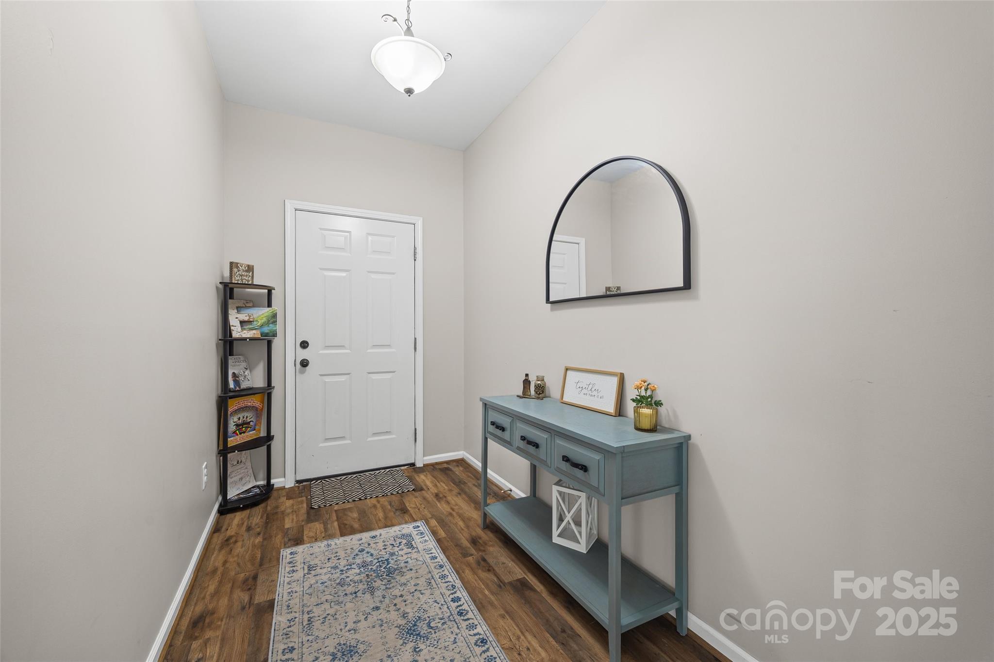 611 Pondway Downs Rock Hill, SC 29730 - Photo 3 of 43 wooden floor with a bench in a room