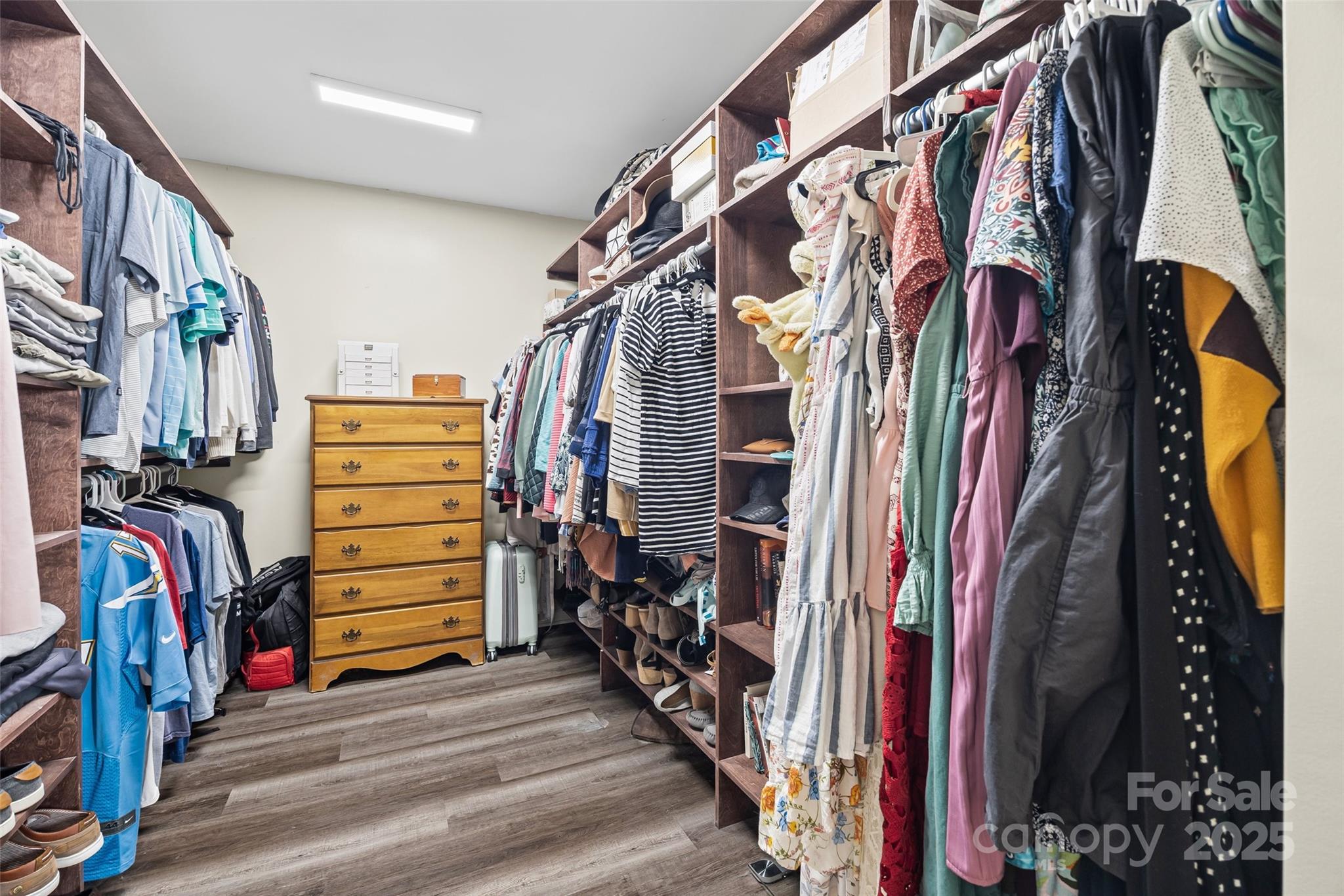 611 Pondway Downs Rock Hill, SC 29730 - Photo 34 of 43 a view of walk in closet with clothes