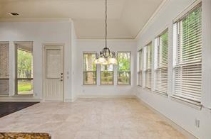 961 Deer Run Prosper, TX 75078 - Photo 4 of 12 a view of an empty room with a window