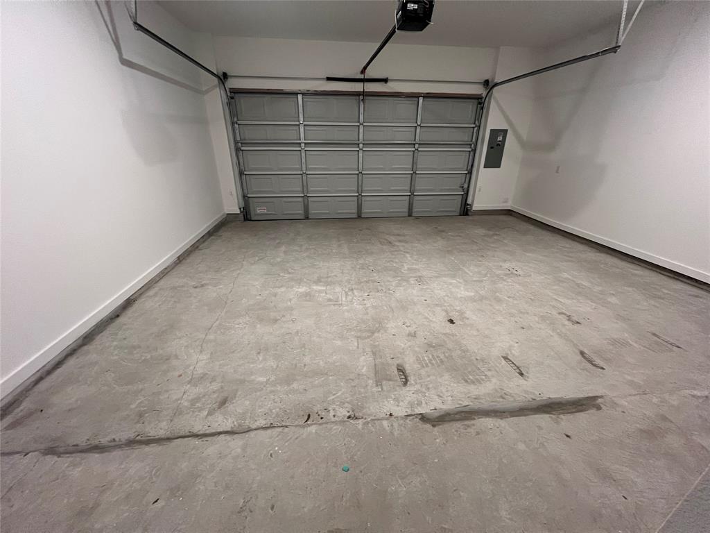 3708 Queen Road Sherman, TX 75090 - Photo 25 of 30 Garage with a garage door opener
