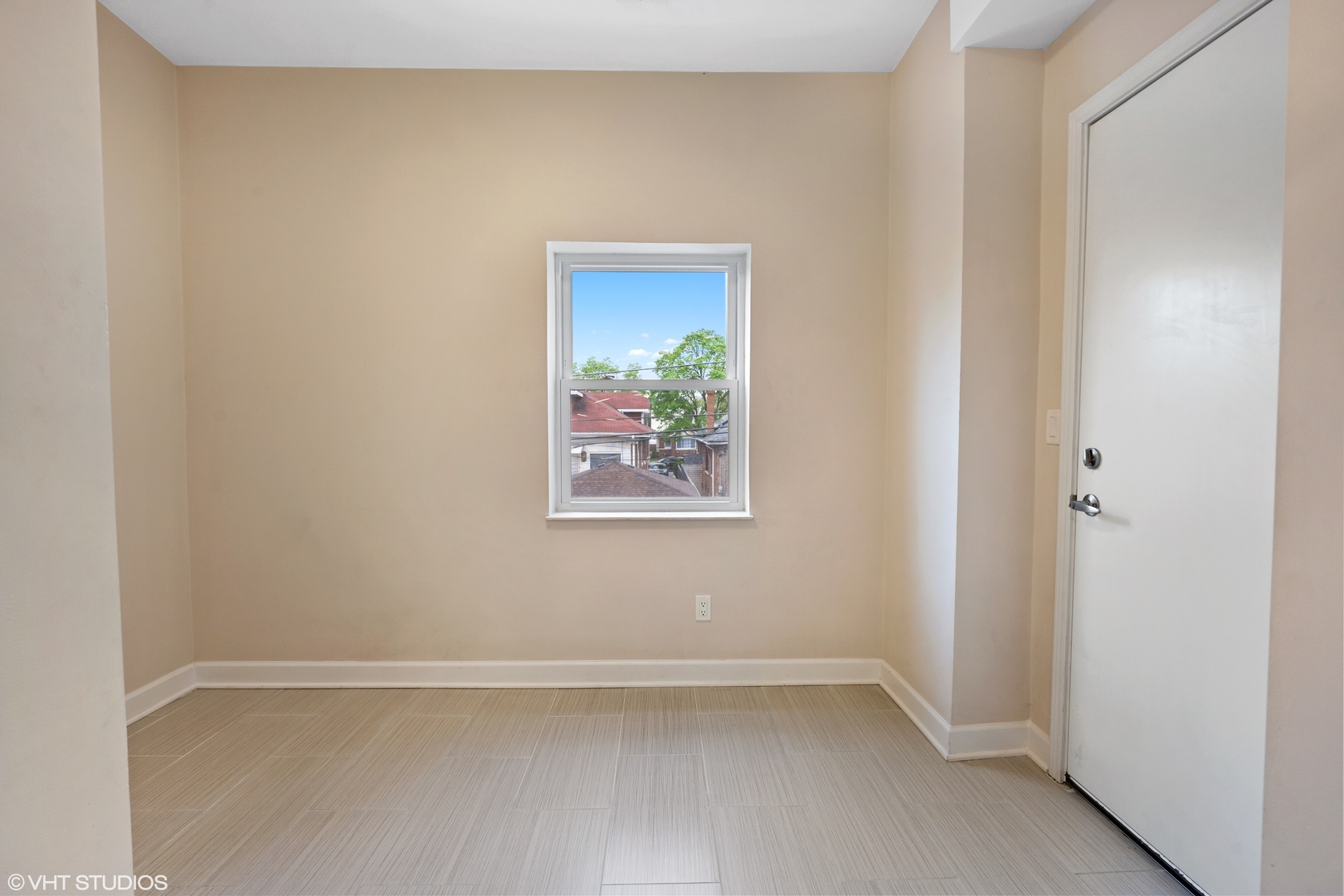 4944 North Drake Avenue, Unit 2 Chicago, IL 60625 - Photo 6 of 13 a view of a small space with a window