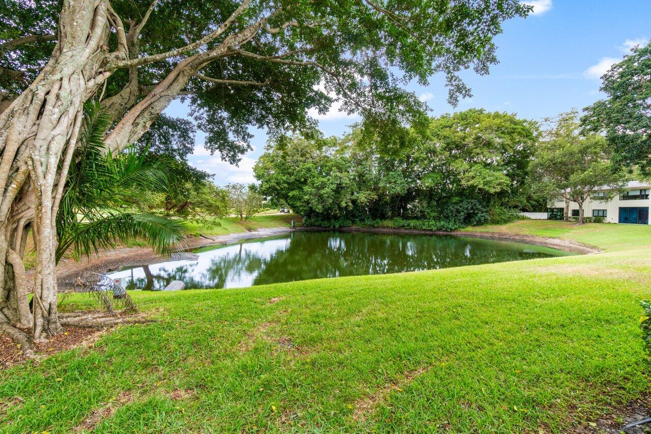 20 Westgate Lane, Unit B Boynton Beach, FL 33436 - Photo 23 of 46 a view of a lake