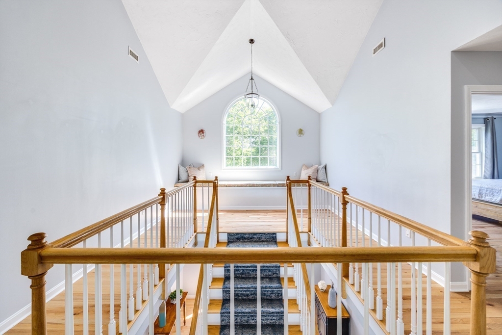 141 Cairn Ridge Road East Falmouth, MA 02536 - Photo 23 of 42 a view of a hallway with windows