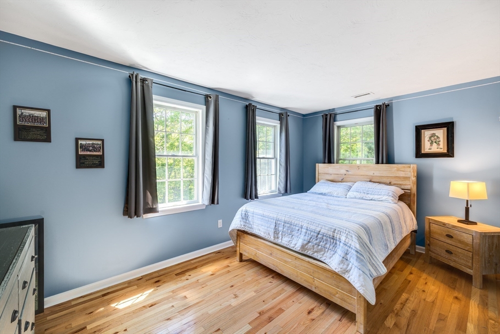 141 Cairn Ridge Road East Falmouth, MA 02536 - Photo 26 of 42 a bedroom with a bed and window