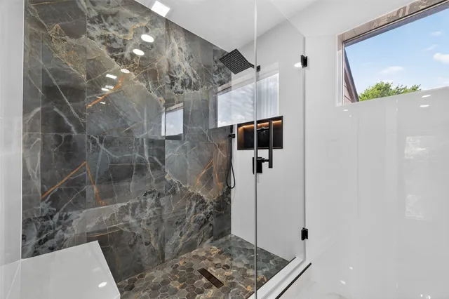 a bathroom with a sink and a bathtub