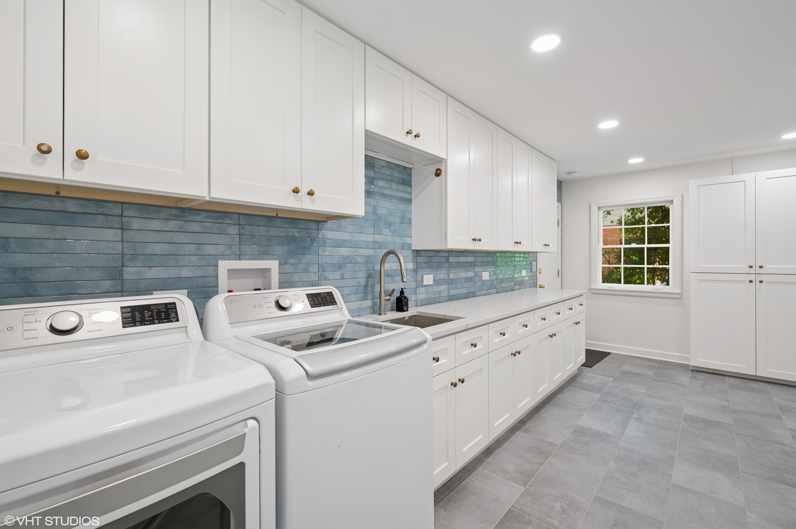1560 Tower Road Winnetka, IL 60093 - Photo 13 of 27 a kitchen that has a sink and a stove