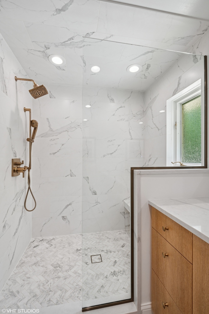 1560 Tower Road Winnetka, IL 60093 - Photo 16 of 27 a bathroom with a shower