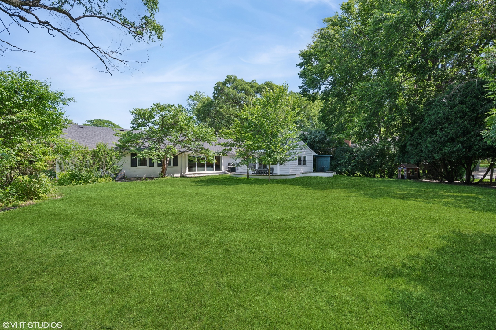 1560 Tower Road Winnetka, IL 60093 - Photo 25 of 27 a view of green field with trees in the background