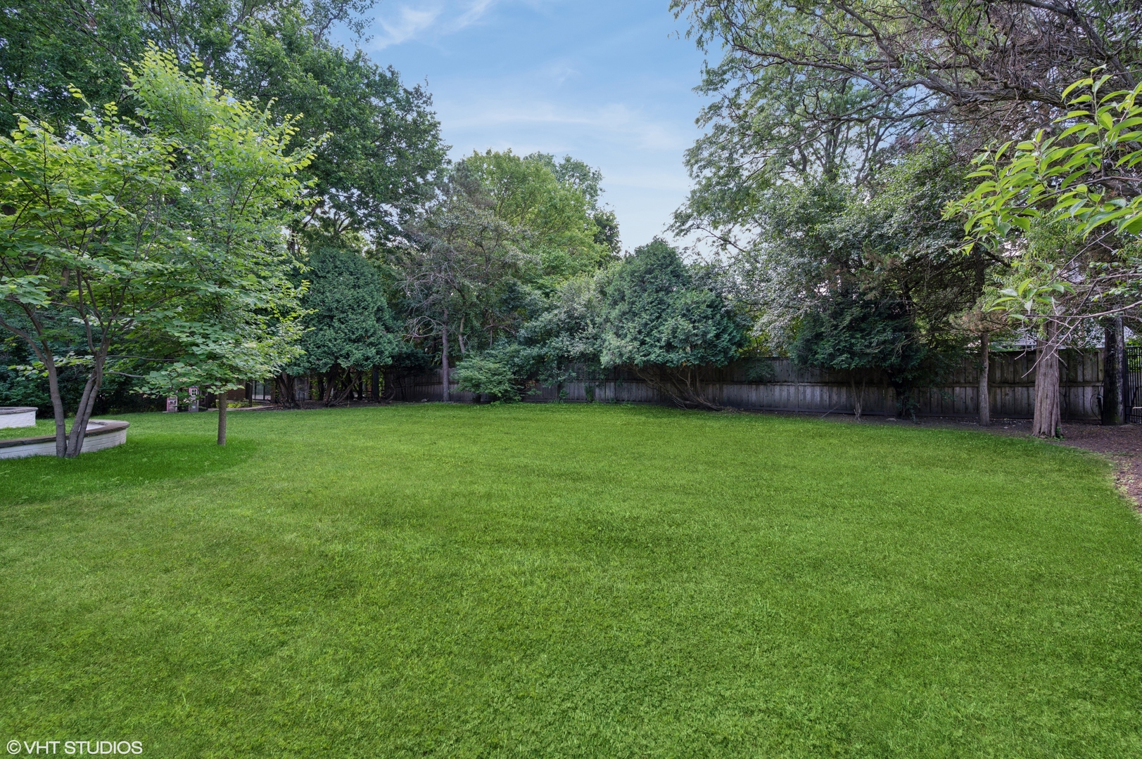 1560 Tower Road Winnetka, IL 60093 - Photo 26 of 27 a view of a yard with a house in the background